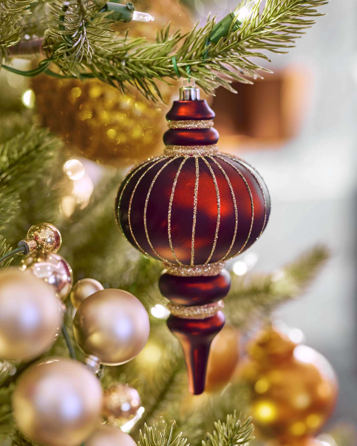 Balsam Hill Royal Burgundy Artificial Christmas Ornament Set on Garland Display