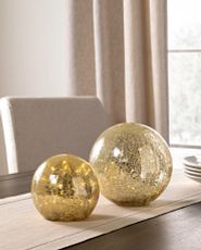 Pair of mercury glass orbs with fairy lights