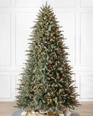 Blue spruce artificial Christmas tree pre-lit with multicolor lights