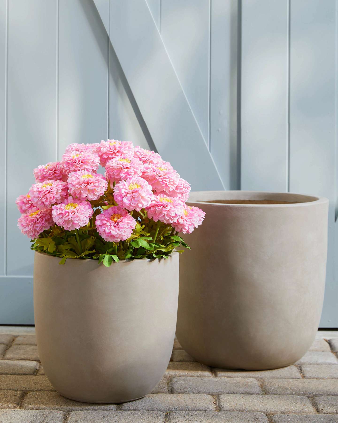 Balsam Hill Beige Outdoor Grecian Planter Lifestyle Outdoor Display with Pink Artificial Florals