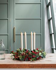 An advent wreath placed on a table