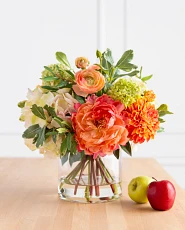 Artificial flower arrangement with hydrangeas, ranunculus, mums, and roses